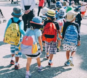 Group of children in backpacks